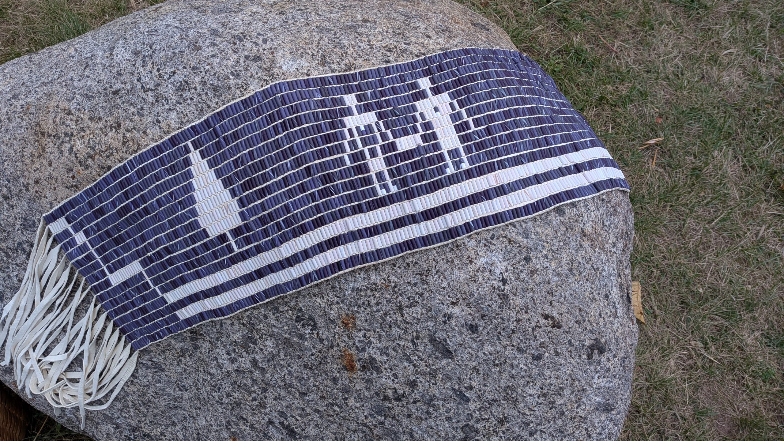 Indigenous Peoples Day Committee and Rochester NY Wampum Belt on Rock